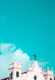 an image of a steeple against a blue sky